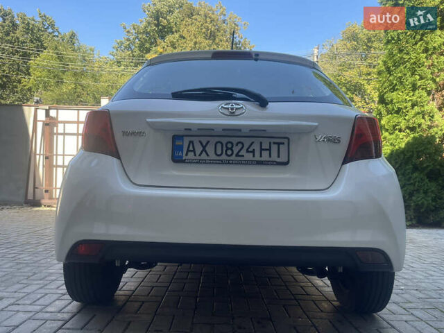 Белый Тойота Ярис, объемом двигателя 1.36 л и пробегом 86 тыс. км за 8500 $, фото 22 на Automoto.ua