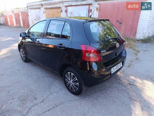 Чорний Тойота Яріс, об'ємом двигуна 1 л та пробігом 232 тис. км за 4800 $, фото 6 на Automoto.ua