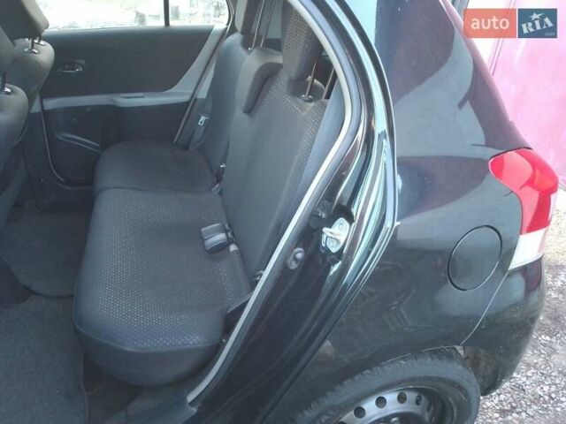 Черный Тойота Ярис, объемом двигателя 1.33 л и пробегом 162 тыс. км за 6500 $, фото 14 на Automoto.ua
