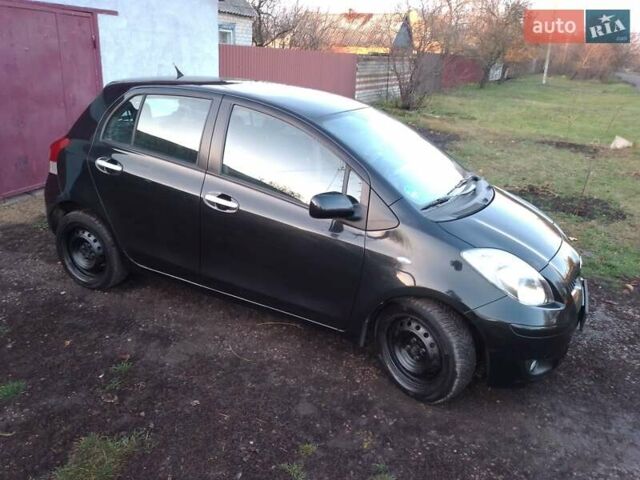 Черный Тойота Ярис, объемом двигателя 1.33 л и пробегом 162 тыс. км за 6500 $, фото 2 на Automoto.ua