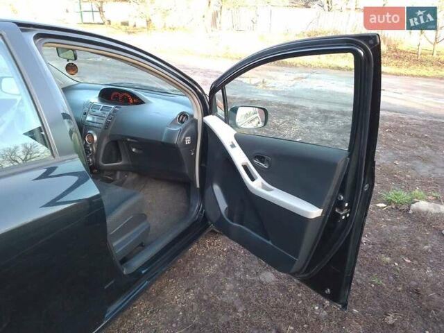 Черный Тойота Ярис, объемом двигателя 1.33 л и пробегом 162 тыс. км за 6500 $, фото 10 на Automoto.ua