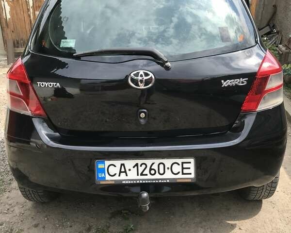 Черный Тойота Ярис, объемом двигателя 1.4 л и пробегом 149 тыс. км за 7000 $, фото 4 на Automoto.ua