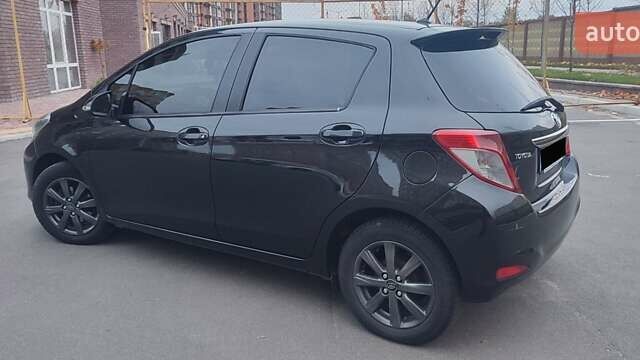 Черный Тойота Ярис, объемом двигателя 1.33 л и пробегом 158 тыс. км за 9500 $, фото 18 на Automoto.ua