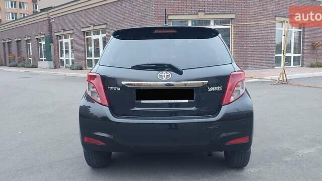 Черный Тойота Ярис, объемом двигателя 1.33 л и пробегом 158 тыс. км за 9500 $, фото 16 на Automoto.ua