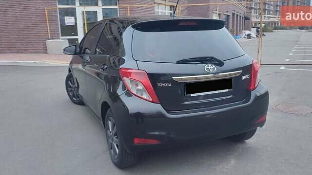 Черный Тойота Ярис, объемом двигателя 1.33 л и пробегом 158 тыс. км за 9500 $, фото 17 на Automoto.ua