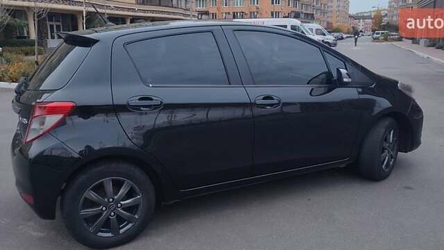 Черный Тойота Ярис, объемом двигателя 1.33 л и пробегом 158 тыс. км за 9500 $, фото 14 на Automoto.ua