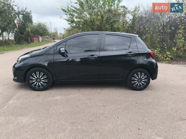 Черный Тойота Ярис, объемом двигателя 1.33 л и пробегом 149 тыс. км за 7600 $, фото 1 на Automoto.ua