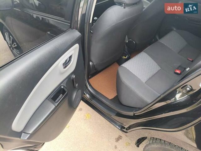 Черный Тойота Ярис, объемом двигателя 1.33 л и пробегом 149 тыс. км за 7600 $, фото 15 на Automoto.ua