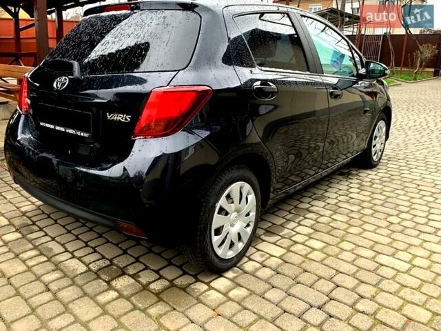 Черный Тойота Ярис, объемом двигателя 1.36 л и пробегом 136 тыс. км за 11112 $, фото 18 на Automoto.ua