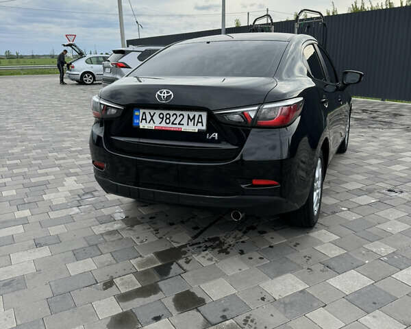 Черный Тойота Ярис, объемом двигателя 1.5 л и пробегом 98 тыс. км за 12500 $, фото 39 на Automoto.ua