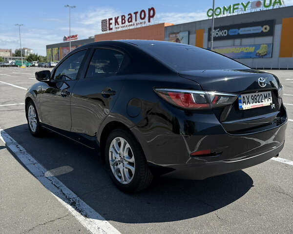 Черный Тойота Ярис, объемом двигателя 1.5 л и пробегом 98 тыс. км за 12500 $, фото 13 на Automoto.ua