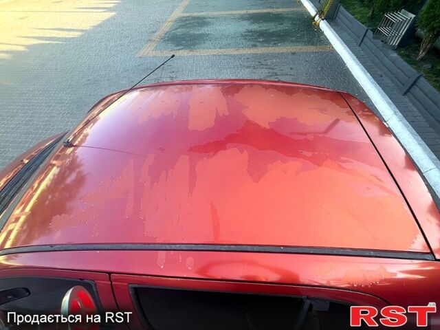 Червоний Тойота Яріс, об'ємом двигуна 1.3 л та пробігом 199 тис. км за 4000 $, фото 5 на Automoto.ua