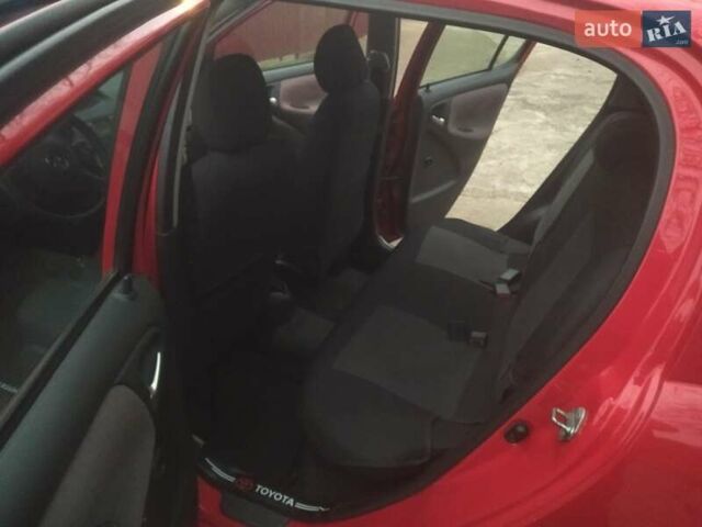 Червоний Тойота Яріс, об'ємом двигуна 1.3 л та пробігом 268 тис. км за 5500 $, фото 9 на Automoto.ua