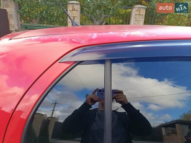 Червоний Тойота Яріс, об'ємом двигуна 1.3 л та пробігом 152 тис. км за 6000 $, фото 10 на Automoto.ua