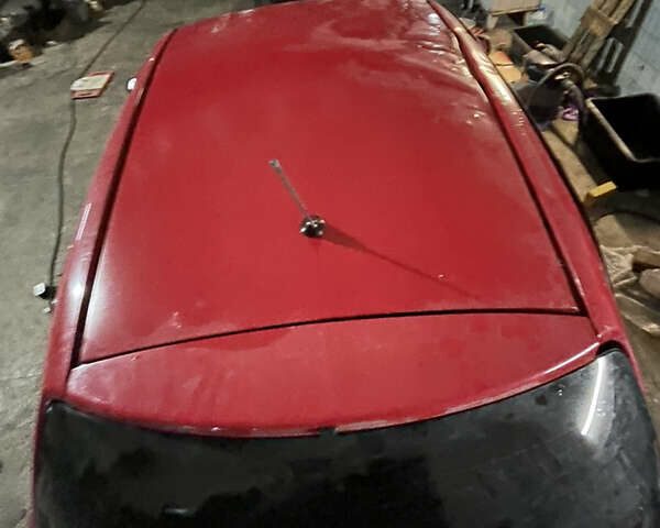 Красный Тойота Ярис, объемом двигателя 1.3 л и пробегом 200 тыс. км за 2400 $, фото 4 на Automoto.ua