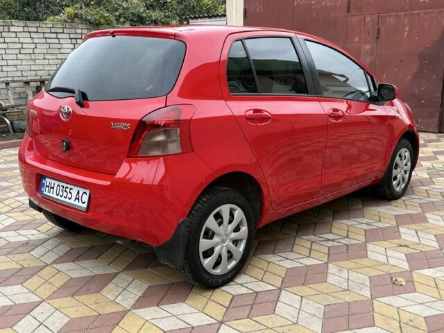 Красный Тойота Ярис, объемом двигателя 1.3 л и пробегом 142 тыс. км за 6000 $, фото 2 на Automoto.ua