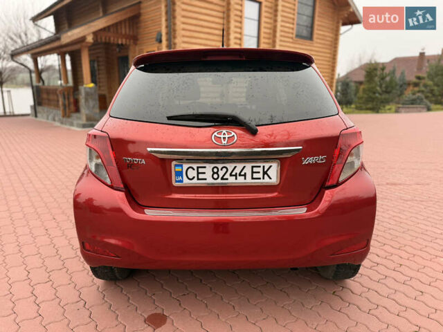 Красный Тойота Ярис, объемом двигателя 1.33 л и пробегом 140 тыс. км за 6700 $, фото 5 на Automoto.ua