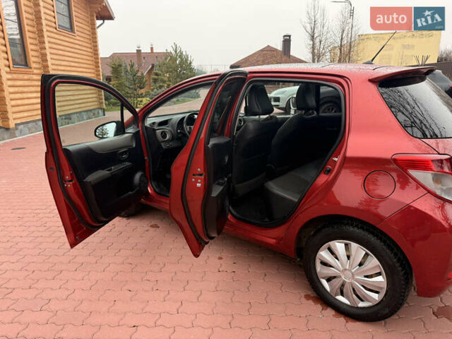 Красный Тойота Ярис, объемом двигателя 1.33 л и пробегом 140 тыс. км за 6700 $, фото 21 на Automoto.ua