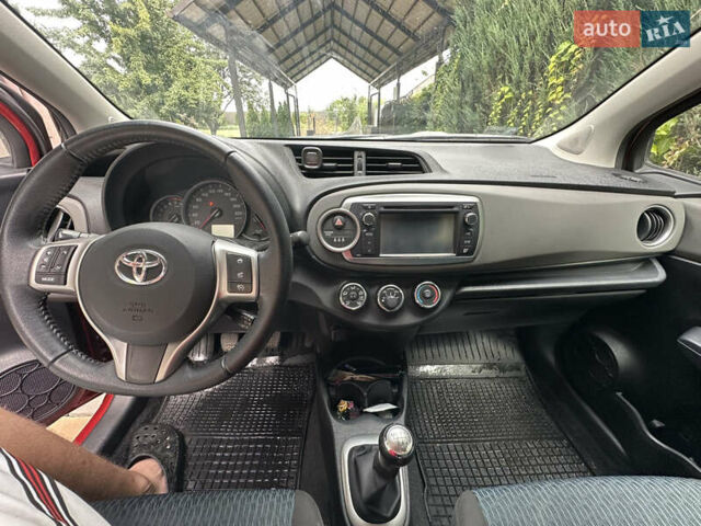 Красный Тойота Ярис, объемом двигателя 1.33 л и пробегом 129 тыс. км за 7300 $, фото 16 на Automoto.ua