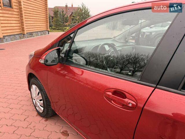 Красный Тойота Ярис, объемом двигателя 1.33 л и пробегом 140 тыс. км за 6700 $, фото 11 на Automoto.ua