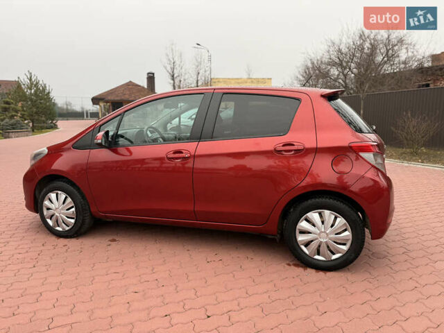Красный Тойота Ярис, объемом двигателя 1.33 л и пробегом 140 тыс. км за 6700 $, фото 6 на Automoto.ua