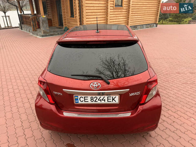 Красный Тойота Ярис, объемом двигателя 1.33 л и пробегом 140 тыс. км за 6700 $, фото 9 на Automoto.ua