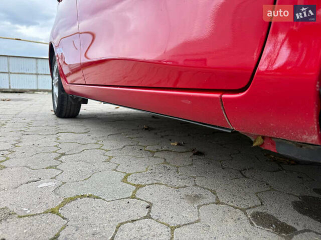 Червоний Тойота Яріс, об'ємом двигуна 1.36 л та пробігом 127 тис. км за 6300 $, фото 13 на Automoto.ua