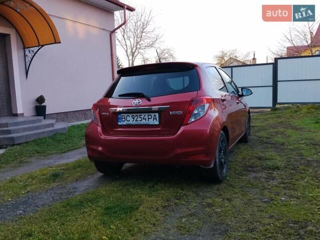 Красный Тойота Ярис, объемом двигателя 1.3 л и пробегом 177 тыс. км за 7600 $, фото 5 на Automoto.ua
