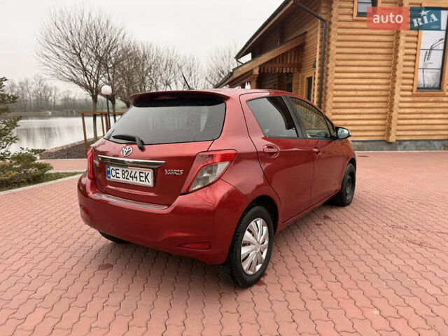 Красный Тойота Ярис, объемом двигателя 1.33 л и пробегом 140 тыс. км за 6700 $, фото 4 на Automoto.ua