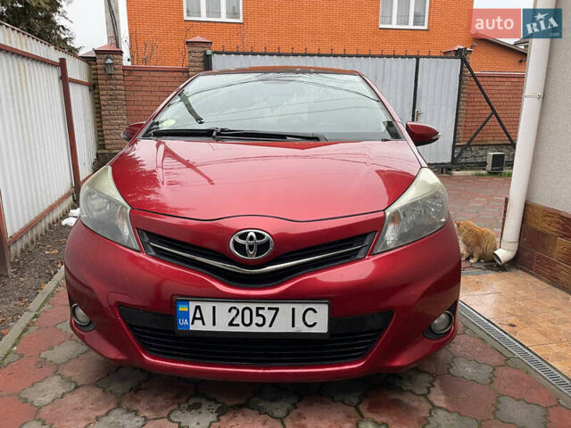 Красный Тойота Ярис, объемом двигателя 1.4 л и пробегом 232 тыс. км за 6500 $, фото 4 на Automoto.ua