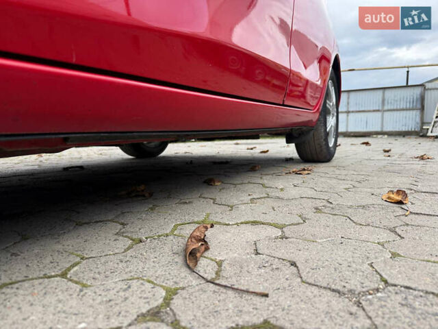 Червоний Тойота Яріс, об'ємом двигуна 1.36 л та пробігом 127 тис. км за 6300 $, фото 12 на Automoto.ua