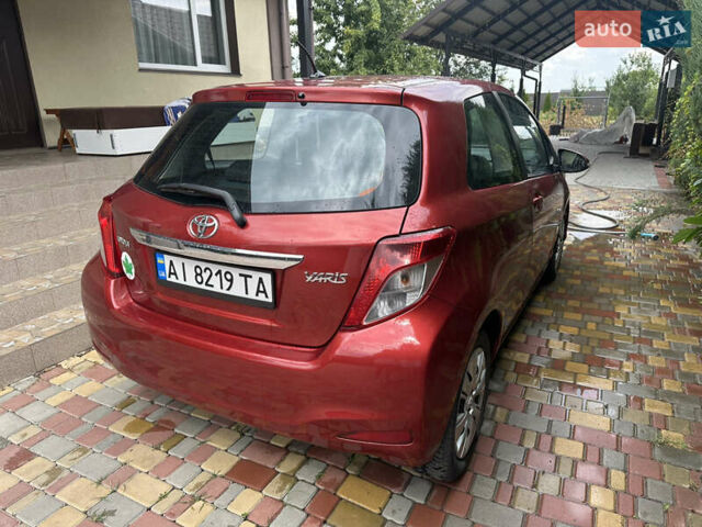 Красный Тойота Ярис, объемом двигателя 1.33 л и пробегом 129 тыс. км за 7300 $, фото 5 на Automoto.ua