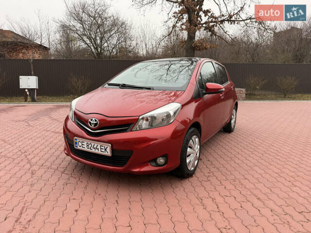Красный Тойота Ярис, объемом двигателя 1.33 л и пробегом 140 тыс. км за 6700 $, фото 2 на Automoto.ua
