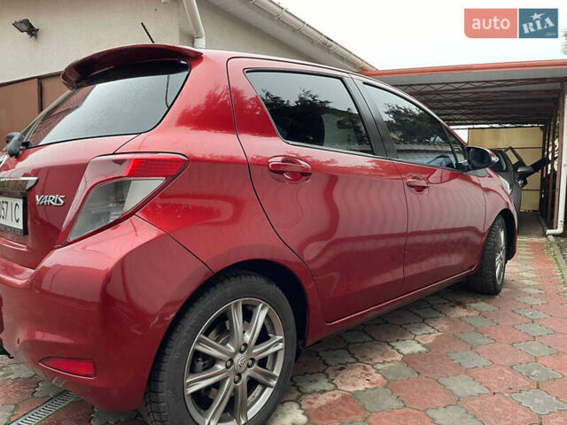 Красный Тойота Ярис, объемом двигателя 1.4 л и пробегом 232 тыс. км за 6500 $, фото 6 на Automoto.ua