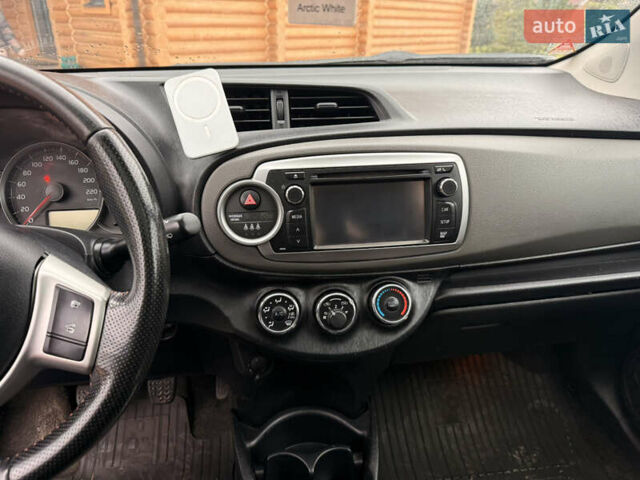 Красный Тойота Ярис, объемом двигателя 1.33 л и пробегом 140 тыс. км за 6700 $, фото 18 на Automoto.ua