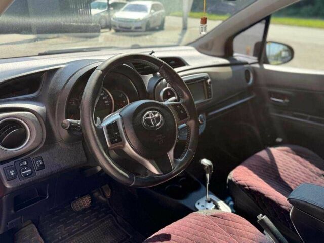 Красный Тойота Ярис, объемом двигателя 1.4 л и пробегом 269 тыс. км за 7600 $, фото 7 на Automoto.ua