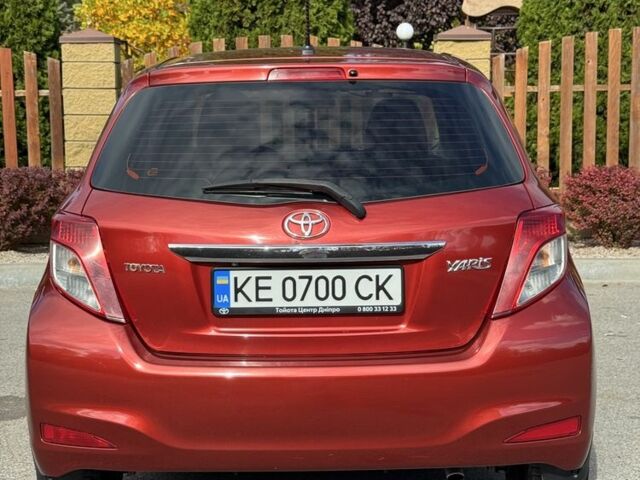 Червоний Тойота Яріс, об'ємом двигуна 1.3 л та пробігом 130 тис. км за 8950 $, фото 2 на Automoto.ua