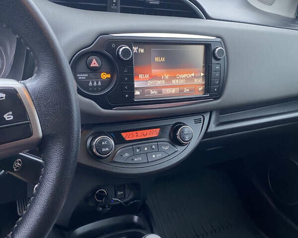 Червоний Тойота Яріс, об'ємом двигуна 1.33 л та пробігом 115 тис. км за 11700 $, фото 9 на Automoto.ua