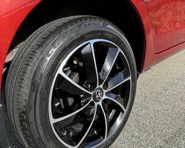 Червоний Тойота Яріс, об'ємом двигуна 1.33 л та пробігом 114 тис. км за 11200 $, фото 12 на Automoto.ua