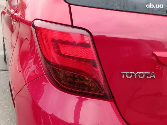 Червоний Тойота Яріс, об'ємом двигуна 1.3 л та пробігом 88 тис. км за 10440 $, фото 9 на Automoto.ua