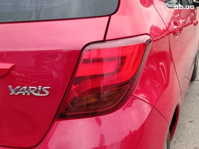 Червоний Тойота Яріс, об'ємом двигуна 1.3 л та пробігом 88 тис. км за 10440 $, фото 8 на Automoto.ua