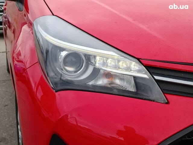 Червоний Тойота Яріс, об'ємом двигуна 1.3 л та пробігом 88 тис. км за 10440 $, фото 3 на Automoto.ua
