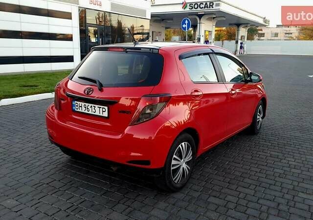 Червоний Тойота Яріс, об'ємом двигуна 1.5 л та пробігом 93 тис. км за 8700 $, фото 13 на Automoto.ua