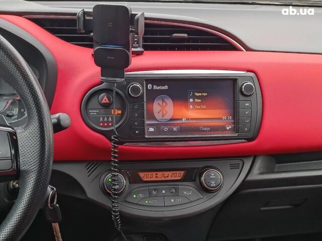 Червоний Тойота Яріс, об'ємом двигуна 1.3 л та пробігом 88 тис. км за 10440 $, фото 15 на Automoto.ua