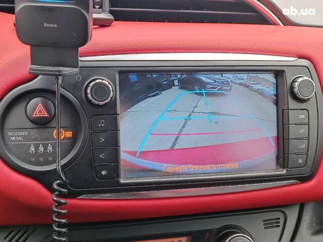 Червоний Тойота Яріс, об'ємом двигуна 1.3 л та пробігом 88 тис. км за 10440 $, фото 26 на Automoto.ua