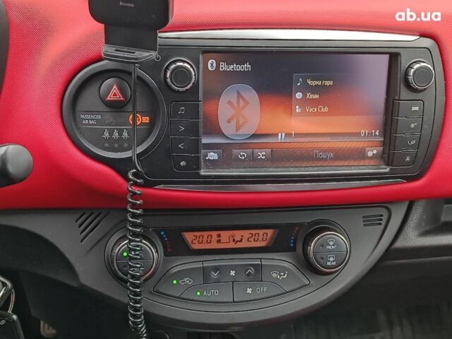 Червоний Тойота Яріс, об'ємом двигуна 1.3 л та пробігом 88 тис. км за 10440 $, фото 25 на Automoto.ua