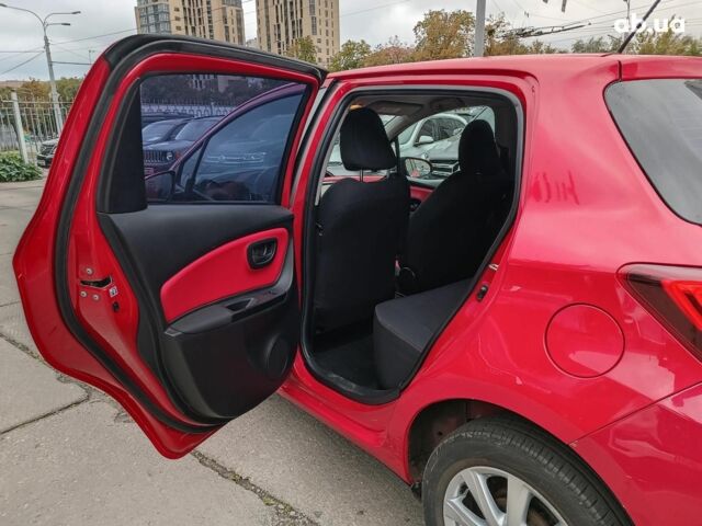 Червоний Тойота Яріс, об'ємом двигуна 1.3 л та пробігом 88 тис. км за 10440 $, фото 12 на Automoto.ua