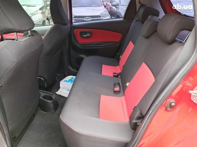 Червоний Тойота Яріс, об'ємом двигуна 1.3 л та пробігом 88 тис. км за 10440 $, фото 11 на Automoto.ua