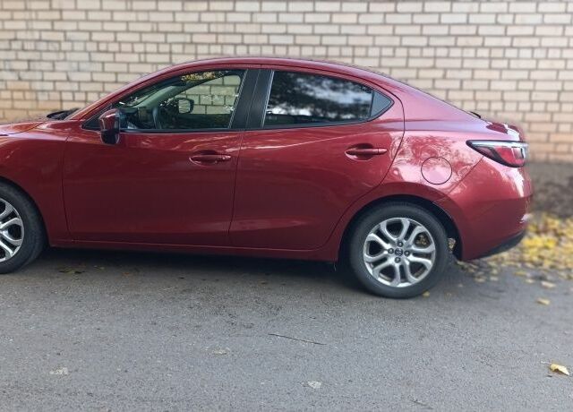 Красный Тойота Ярис, объемом двигателя 1.5 л и пробегом 84 тыс. км за 13200 $, фото 1 на Automoto.ua