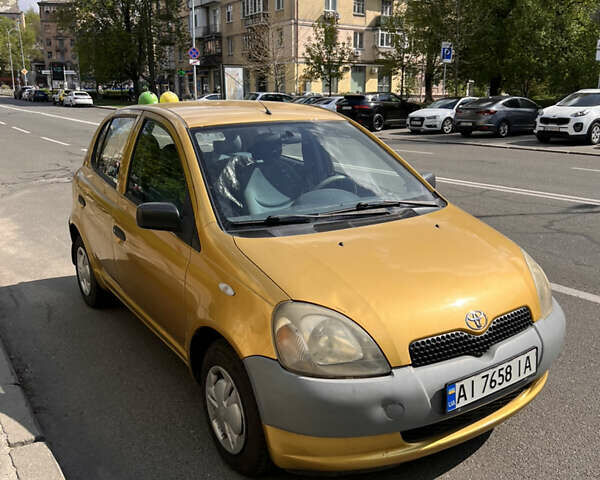 Желтый Тойота Ярис, объемом двигателя 1 л и пробегом 84 тыс. км за 3100 $, фото 1 на Automoto.ua
